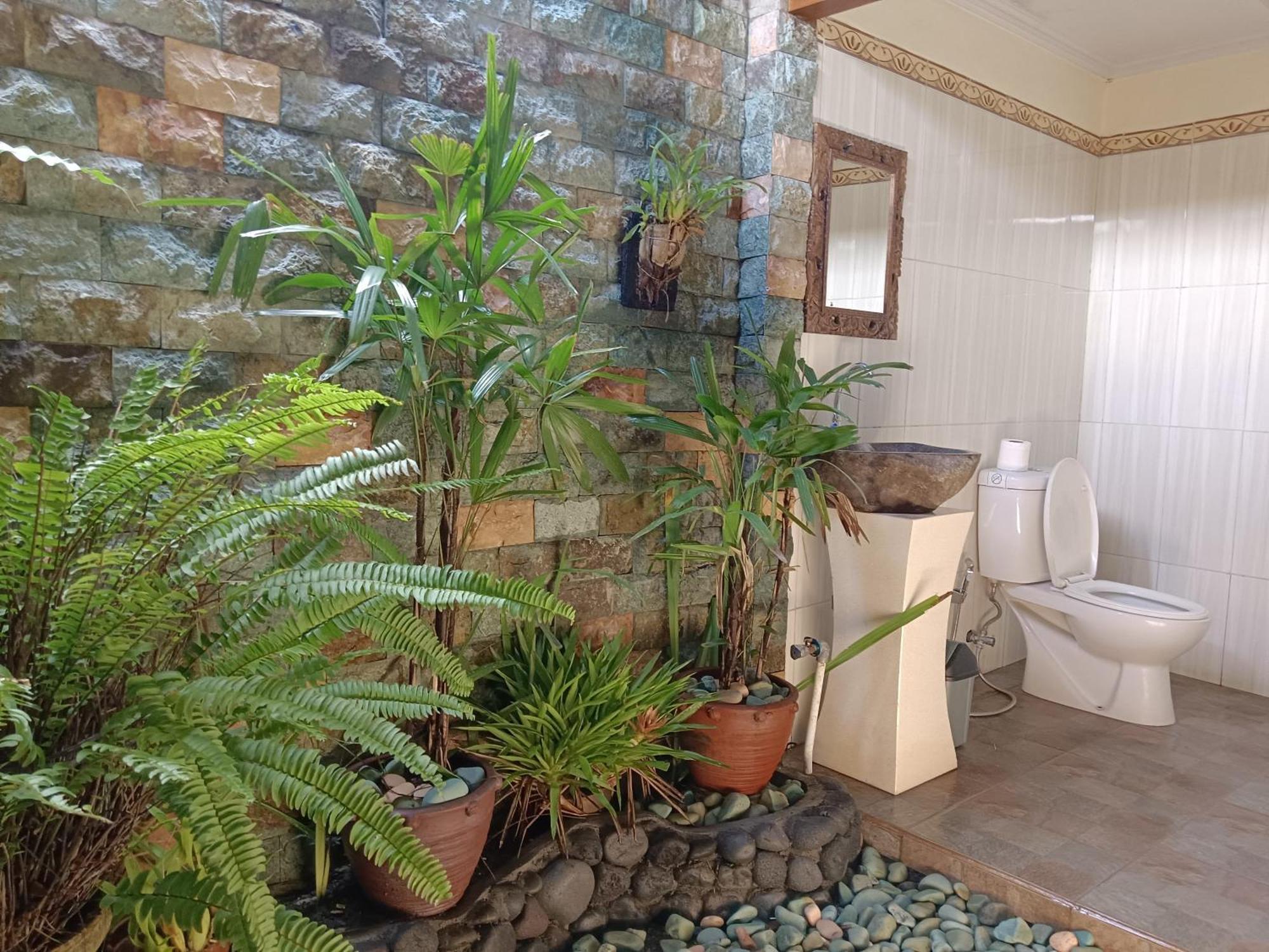 Mancur Guesthouse Убуд Экстерьер фото